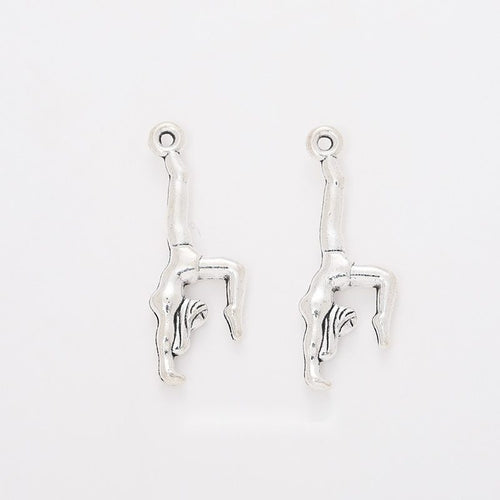 Front display of the handstand gymnast in its pictured metal finishes