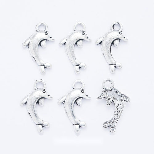 Leaping Dolphin metal piece showing overall shape and available finishes