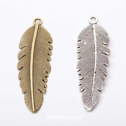 Long Textured Feather metal pieces shown in the available finishes.