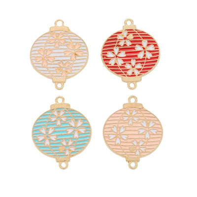 Front and reverse views of enamel lantern charms with measurement and weight guides