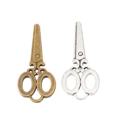 Scissors charm shown in grouped front views
