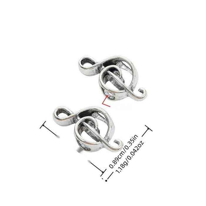 Vintage Style Metal Treble Clef Large Hole Bead in 1 Metal Finish