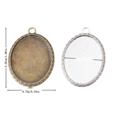 Group view of oval recessed cabochon tray edged by an engraved leaf pattern