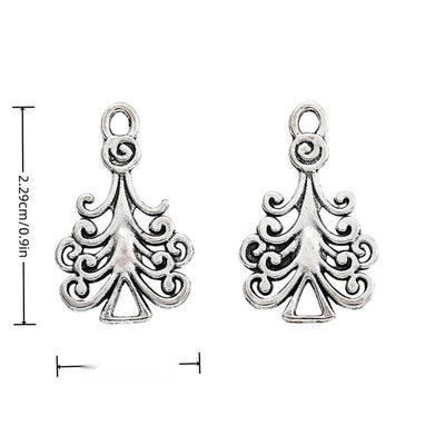 Ornate Christmas Tree Metal Charms in Antique Silver in antique silver displayed together on a white background.