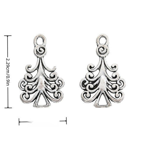 Ornate Christmas Tree Metal Charms in Antique Silver in antique silver displayed together on a white background.
