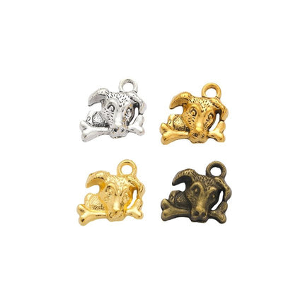 Front comparison of dog biting a bone metal component in 4 finishes