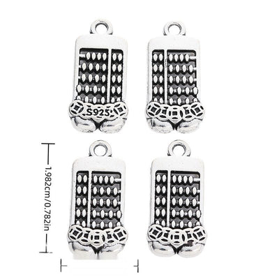 Front and reverse views of double abacus charms with measurement and weight guides