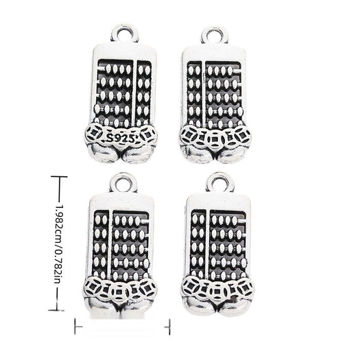 Front and reverse views of double abacus charms with measurement and weight guides