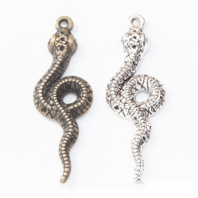 Front comparison of coiled snake metal component in 2 finishes