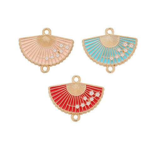 Front and reverse views of enamel fan charms with measurement and weight guides