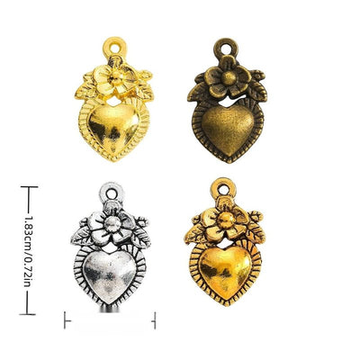 Finish overview of floral framed heart metal charm