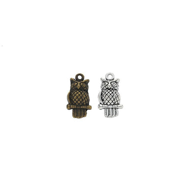 Tiny Perched Owl Charm finish assortment on a white background