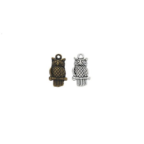 Tiny Perched Owl Charm finish assortment on a white background