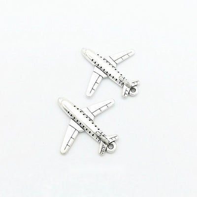 Airplane charm shown in grouped front views
