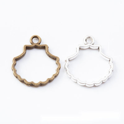 Scalloped Shell Resin Bezel assortment showing the available metal finishes