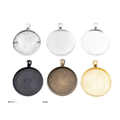 Grouped front views of round bezel pendants