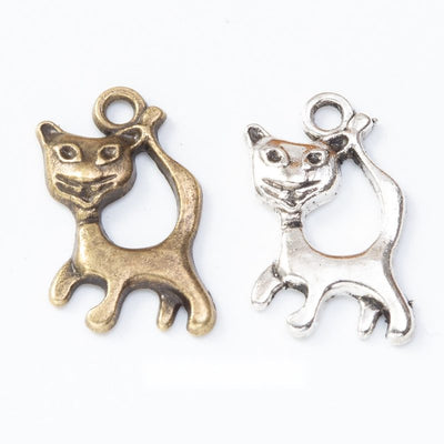 Overview of standing cat charms in the available designs and finishes