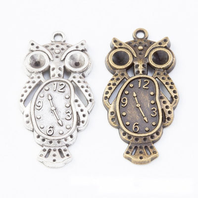 Owl Clock Charm Pendant finish comparison showing an owl body framing a clock face