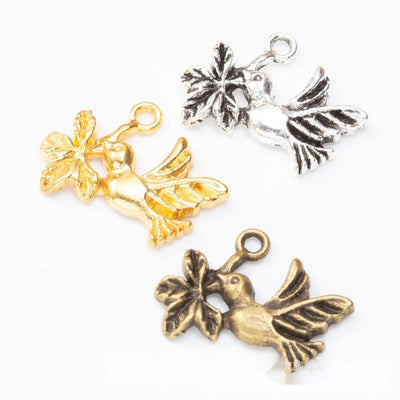 Dove And Flower metal component, front grouping showing the available finishes.