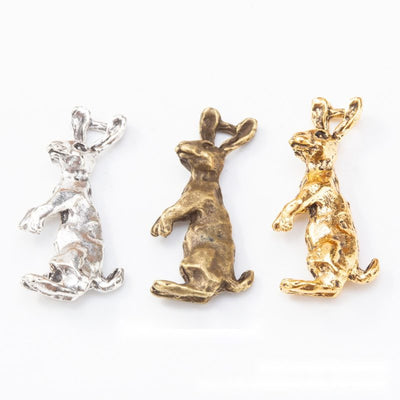 Group view of upright rabbit figure with long ears and dimensional fur details