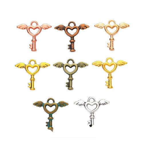 Assorted winged heart key charm shown from the front