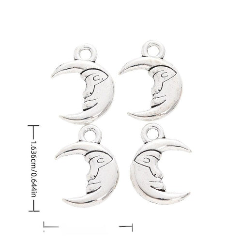 Product image showing the crescent moon face metal charm and its visible metal details
