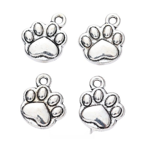 Paw print charm shown in grouped front views