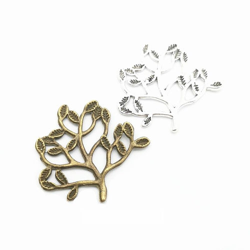 Grouped front views of the openwork leafy tree metal component in two antique finishes