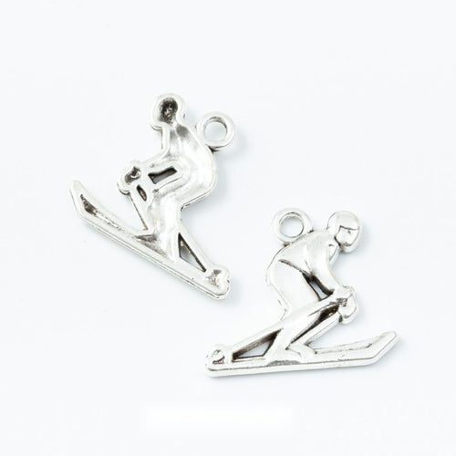 Sledding Boy Charms showing assortment on a white background