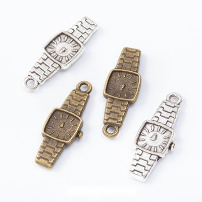Group view of the wristwatch charm showing the available finishes and front details