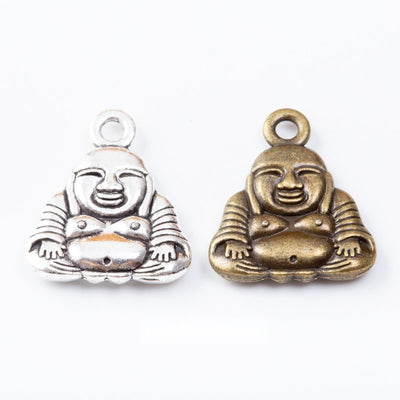 Group view of a seated smiling buddha figure has a rounded belly and top loop