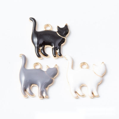 Enamel Cat metal component, front grouping showing the available finishes.