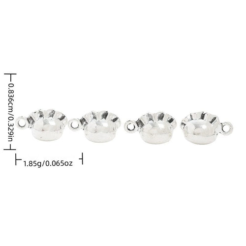 Dumpling Charm showing a pleated dumpling shape with side loops