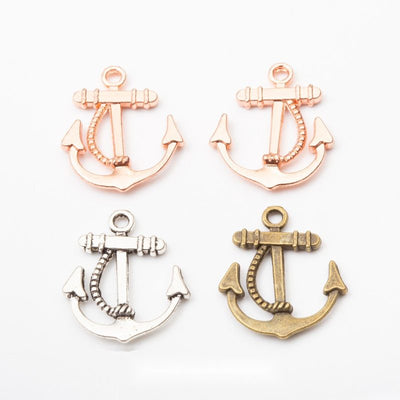 Product photo 1 of the nautical anchor charm highlighting its open anchor silhouette wrapped with rope-like detail