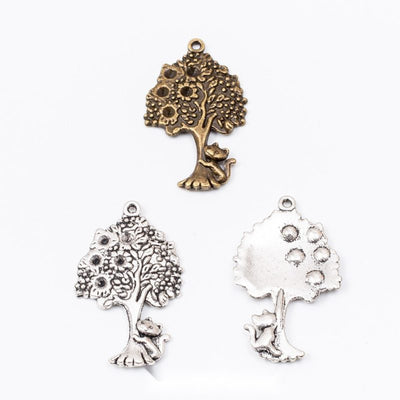 Grouped front views of ornate tree charms
