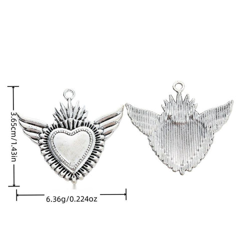 Antique Silver winged sacred heart charm shown in product image 1