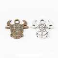 Ox Head Charm with Engraved Face in Two Antique Finishes view 1