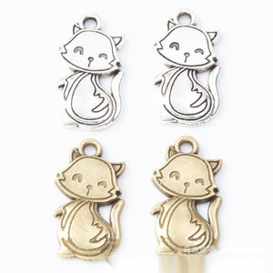 Antique Smiling Cat With Scarf Metal Charm, Two Finishes