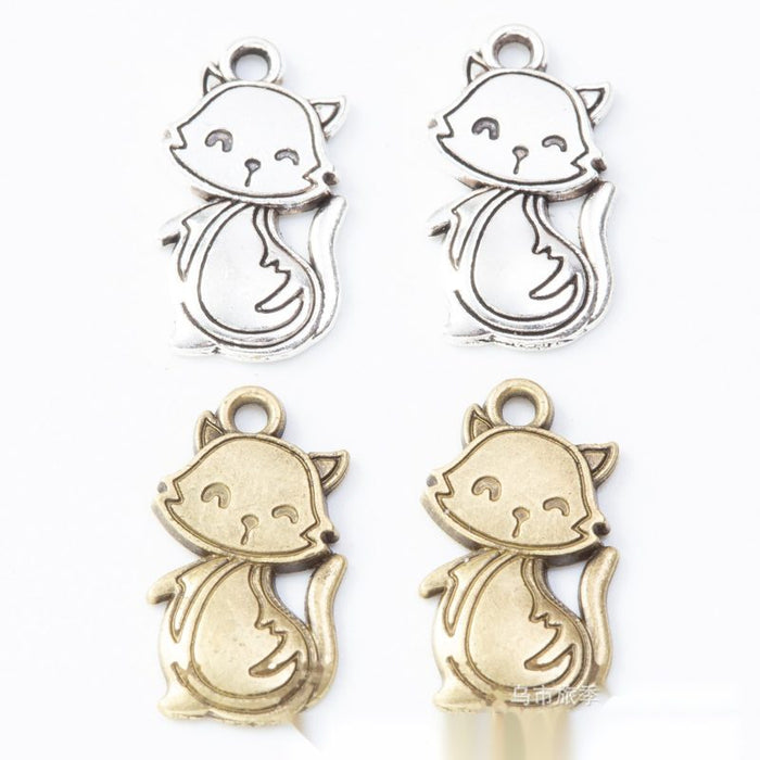 Antique Smiling Cat With Scarf Metal Charm, Two Finishes
