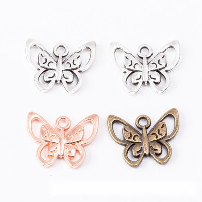 Grouped front view of the openwork butterfly metal charm pendant in all pictured styles