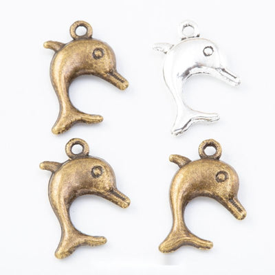 Grouped front views of dolphin charms