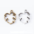 Open Monstera Leaf Metal Bezel Charm in Two Antique Finishes view 1