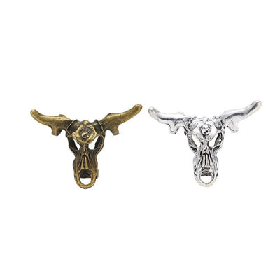 Grouped front views of the longhorn bull skull multi loop connector in two antique finishes