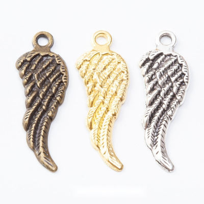 Single Feathered Wing Metal Charm Pendant shown in the available visible finishes