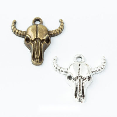 Front view of longhorn cattle skull charm showing finish variation 1