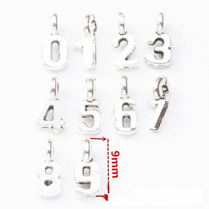 Silver Tone Number Charms From Zero Through Nine With Top Loops