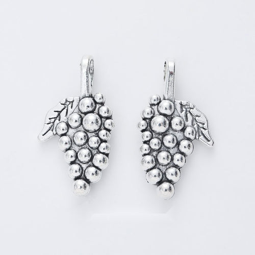 Large Grape Cluster Charm shown in the available metal finishes on white