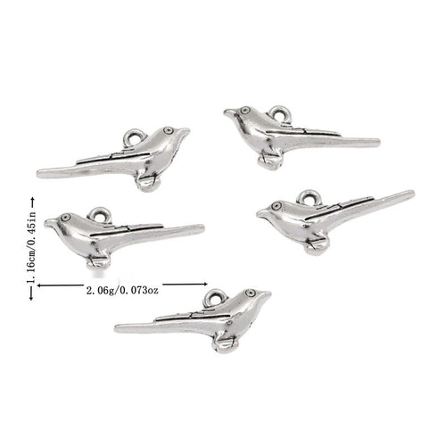 Antique Silver long tail bird charm shown in an overview