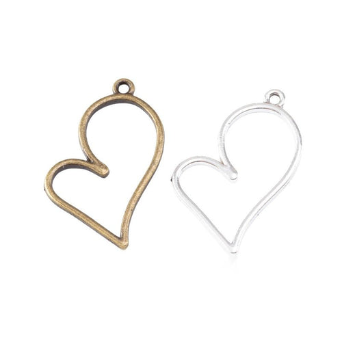Slender open heart frames with top hanging loops arranged together on a white background.