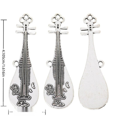 Long pipa lute charm with engraved strings and floral decoration shown in arranged finish comparison